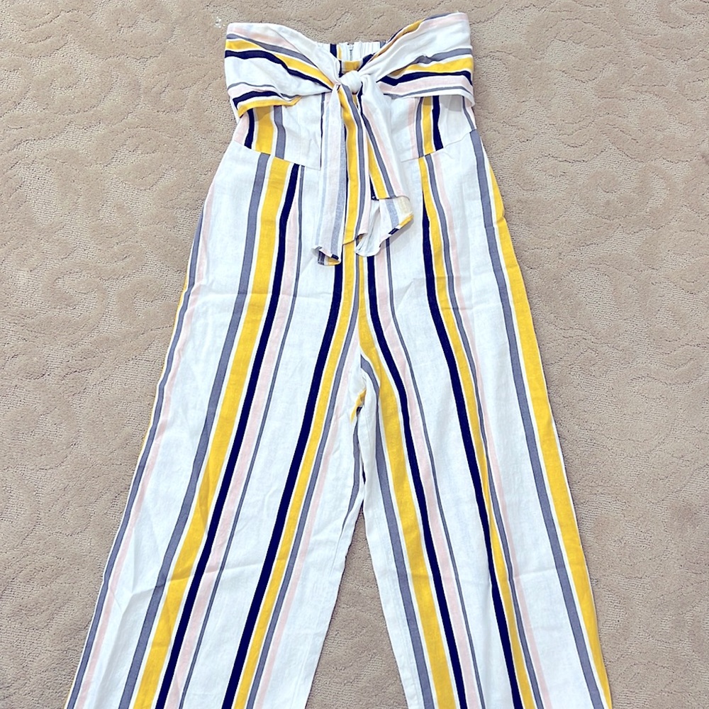 Strapless cropped jumpsuit with bow accent